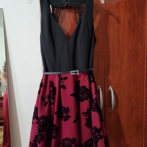 Black and burgundy dress.  Worn a couple of times.  Excellent condition.
